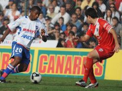 Nacional sigue en carrera