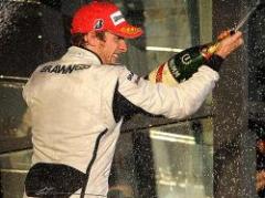 Button gana en Australia