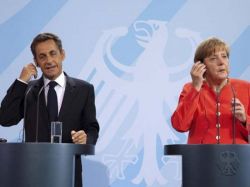 Sarkozy y Merkel retoman iniciativa para calmar mercados