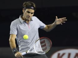 Federer desactiva saque de Raonic y está en cuartos