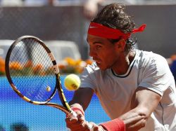 Nadal logra tercer triunfo en Madrid e iguala a Federer