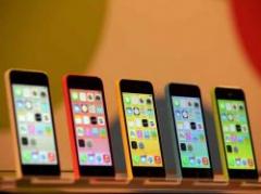 Éxito del iPhone 5 ensombrece estreno de colorido sucesor