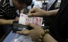 Devaluación del yuan afecta valores y monedas en todo el mundo