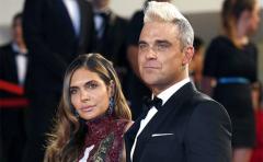 Robbie Williams cree que perjudicó a su esposa