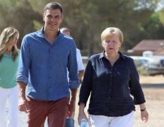 Sánchez y Merkel piden esfuerzo común de la UE y reparto justo de inmigrantes